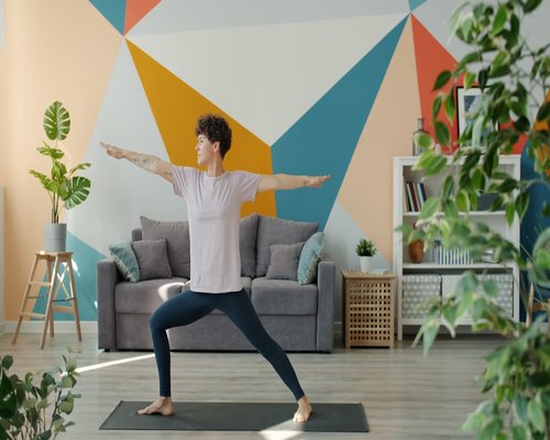 Person doing yoga at home
