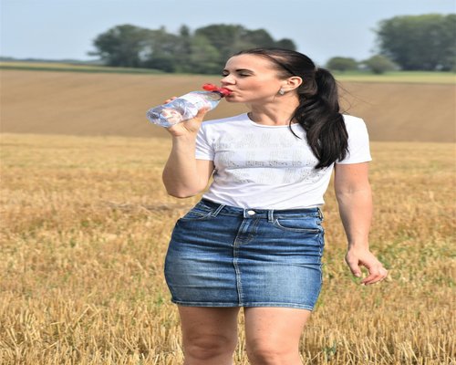 Woman drinking water outdoor